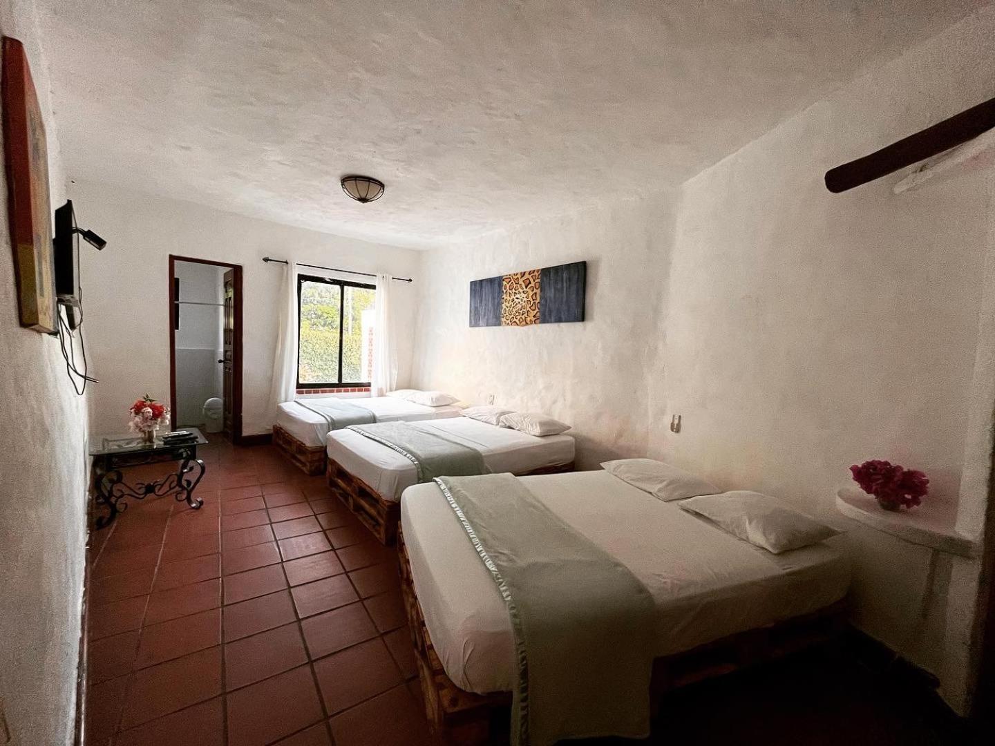 Mia Nueva Gorgona Hotel Стая снимка